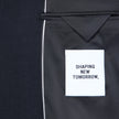 Indersiden af en Motion Blazer Regular i farven Midnight Blue, med et SHAPING NEW TOMORROW-mærke i klassisk dansk design.