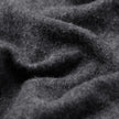 Nærbillede af det bløde, mørkegrå Double Layer Wool Overshirt Regular Dark Grey-stof med folder.