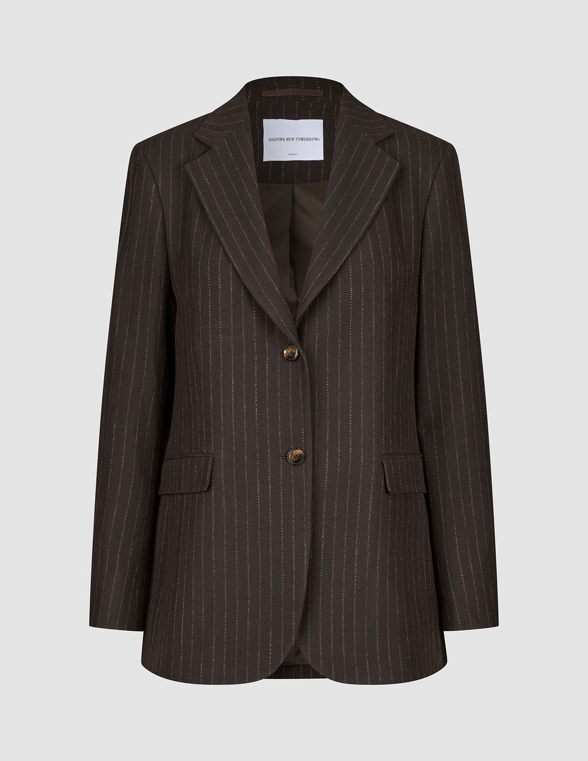 Women Serene Blazer Regular Walnut Herringbone i brun uld med tynde striber, to knapper foran og lommer med klap.